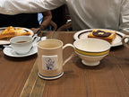 The “Buttercream Ribbon” Mug – A Cozy, All-Day Ceramic Cup